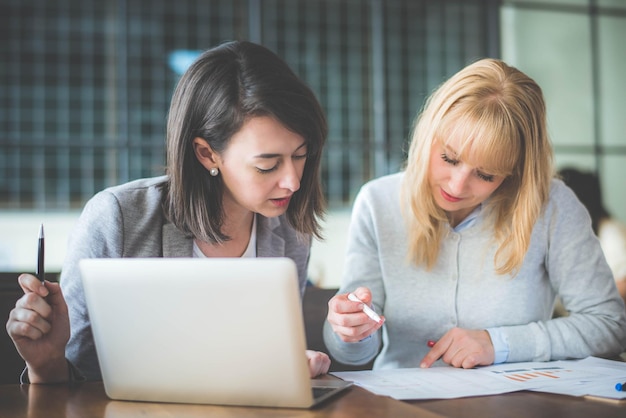 Accountant reviewing financial records at a desk